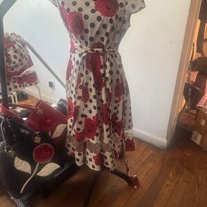 2 dresses1950 style one size large and one XL